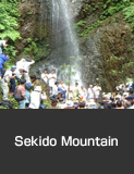 Ascetic monks training under a waterfall. Sekido Mountain, Nakanoto Town.  Summer Culture and Festivals